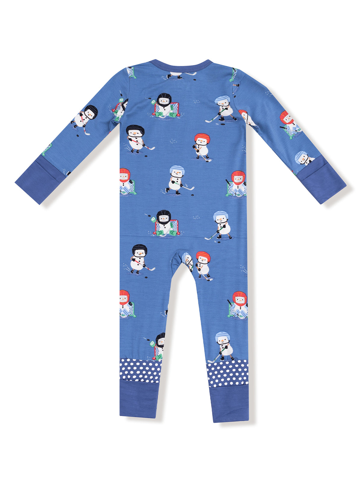 Blue pajama onesie with hockey-playing cartoon characters and polka dot accents. Perfect for winter bedtime fun.