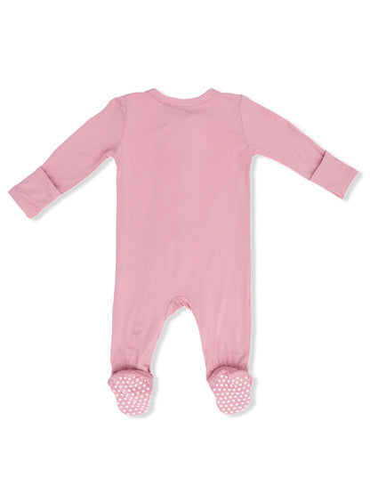 Pink baby onesie with long sleeves and polka dot feet, shown from the back.