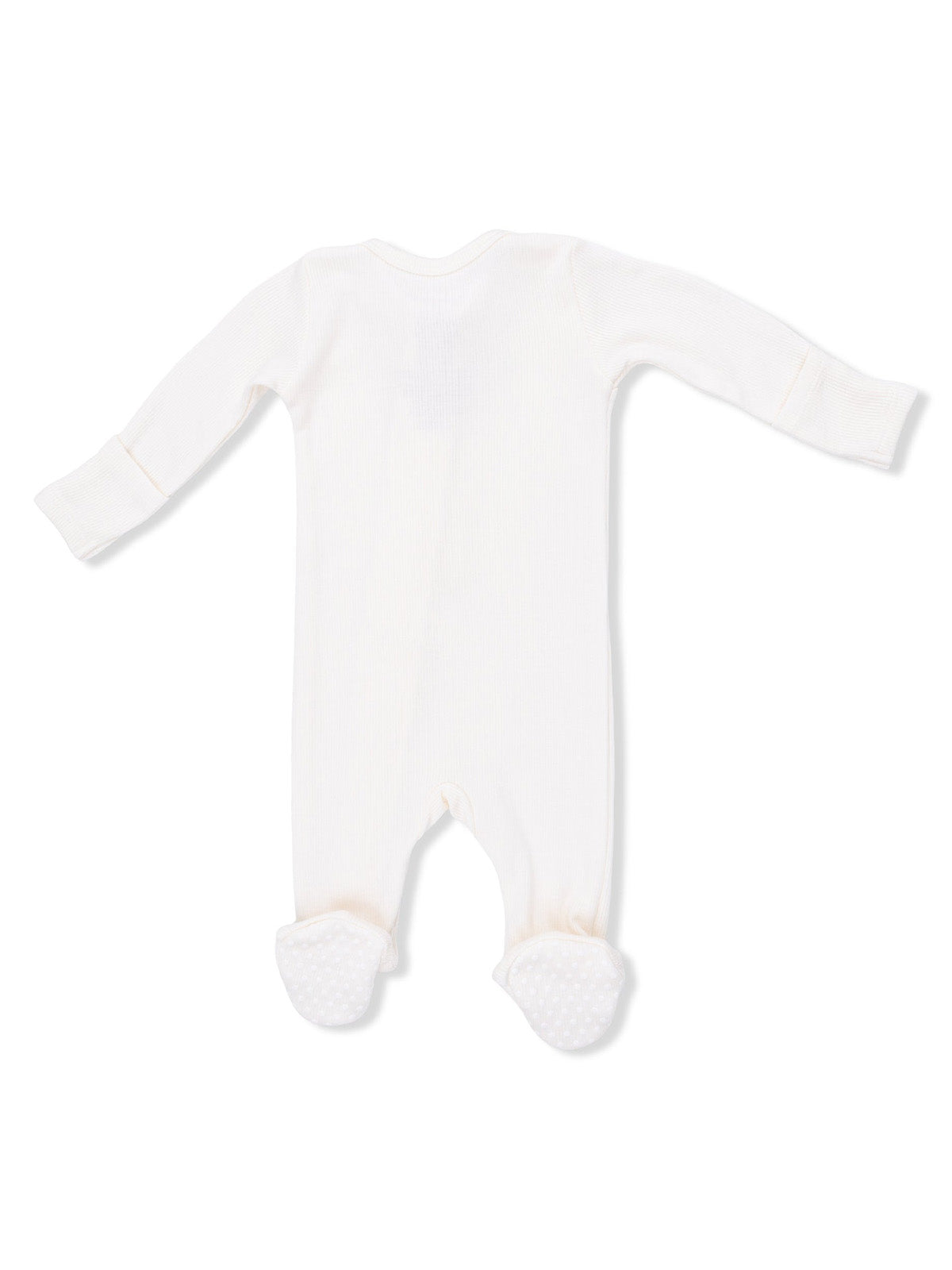 White baby footed onesie with long sleeves and textured soles, viewed from the back.