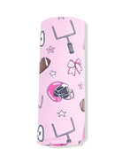 Pink fabric featuring football, helmet, goalposts, and bows patterns. Perfect for sports-themed projects.