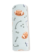 Light blue fabric with footballs, play diagrams, and "Go Team" flags in a playful sports pattern.