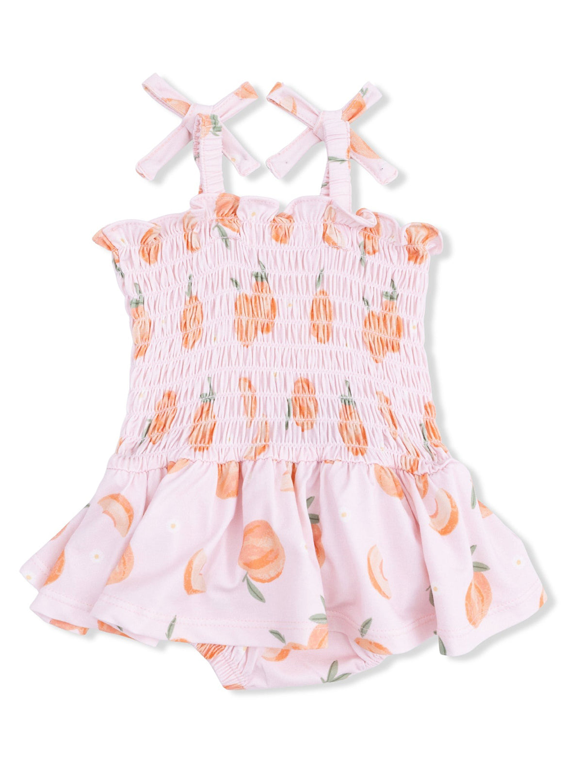 Pink infant romper with peach print, smocked bodice, and crisscross straps. Perfect for summer outings.