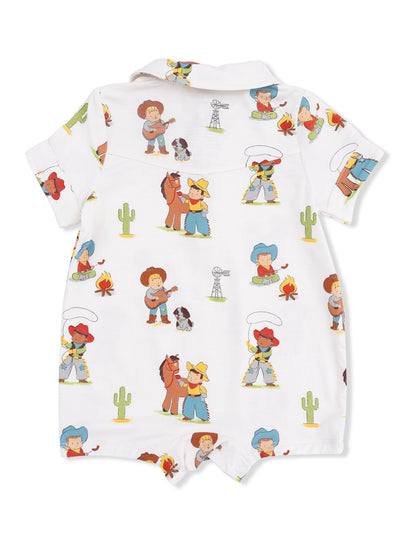 White romper with colorful cowboy-themed illustrations, including kids, horses, and cacti.