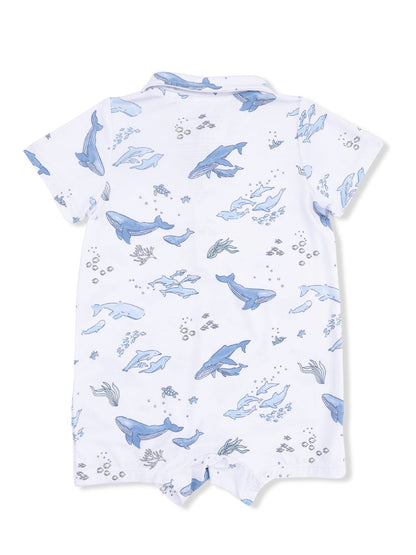 White short-sleeve romper with blue ocean-themed print featuring various sea creatures and plants.