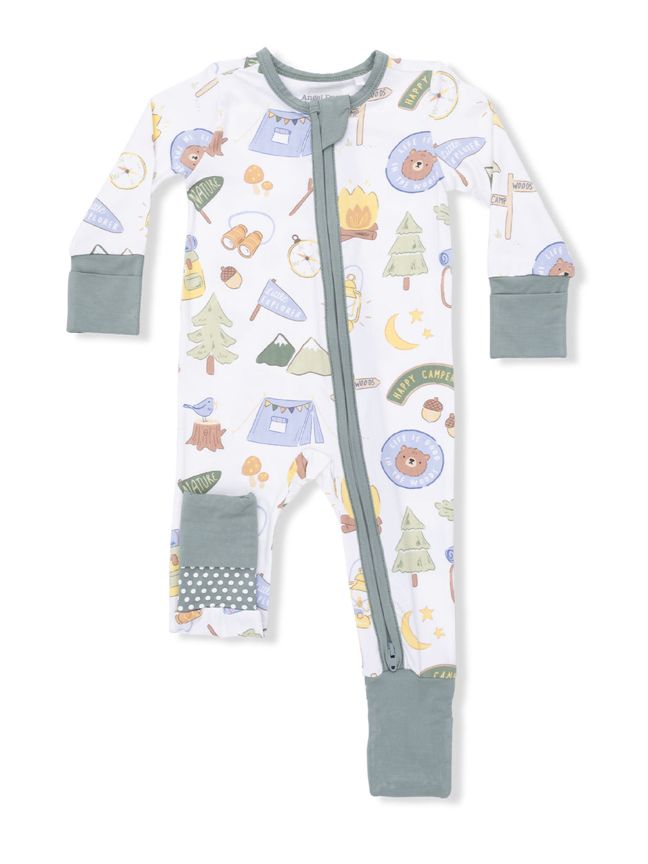 Infant onesie with camping-themed patterns including tents, trees, and wildlife, featuring a front zipper and cuffed sleeves.