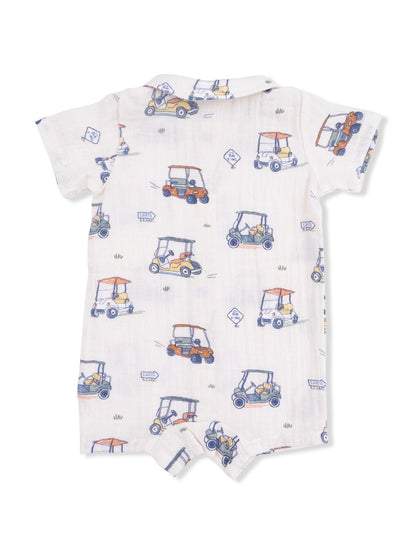 Back view of a children's romper printed with colorful golf carts on a light background.