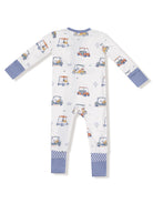 White pajamas featuring colorful golf carts, with blue cuffs and polka dot detailing at the ankles.