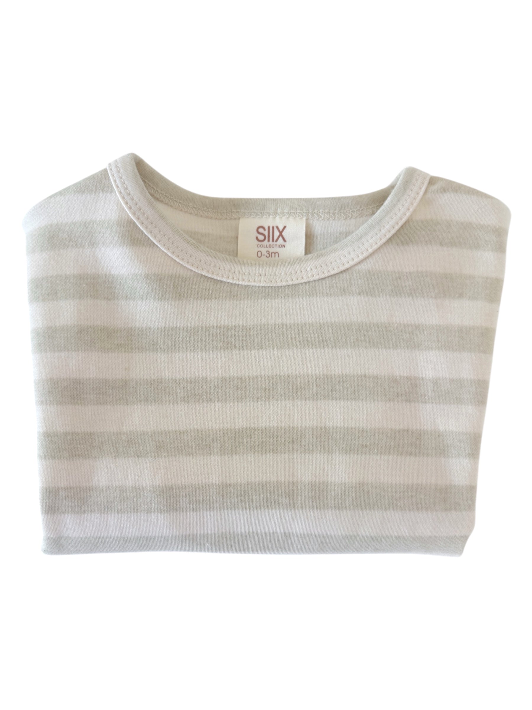 Light gray striped baby shirt folded, featuring a round neckline and label indicating size 0-3 months.