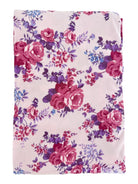 Floral fabric featuring pink and purple roses on a light background, ideal for crafting or sewing projects.