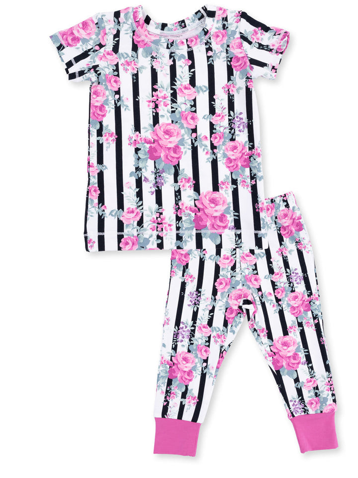 Floral and striped children's pajama set featuring pink roses, black and white stripes, and pink cuffs.