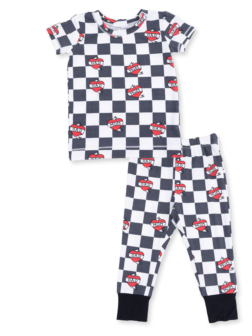Kids' black and white checkered pajama set with "Mom" and "Dad" heart graphics. Short sleeve top and long pants.