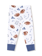 White football-themed leggings with blue cuffs, featuring footballs and play diagrams.
