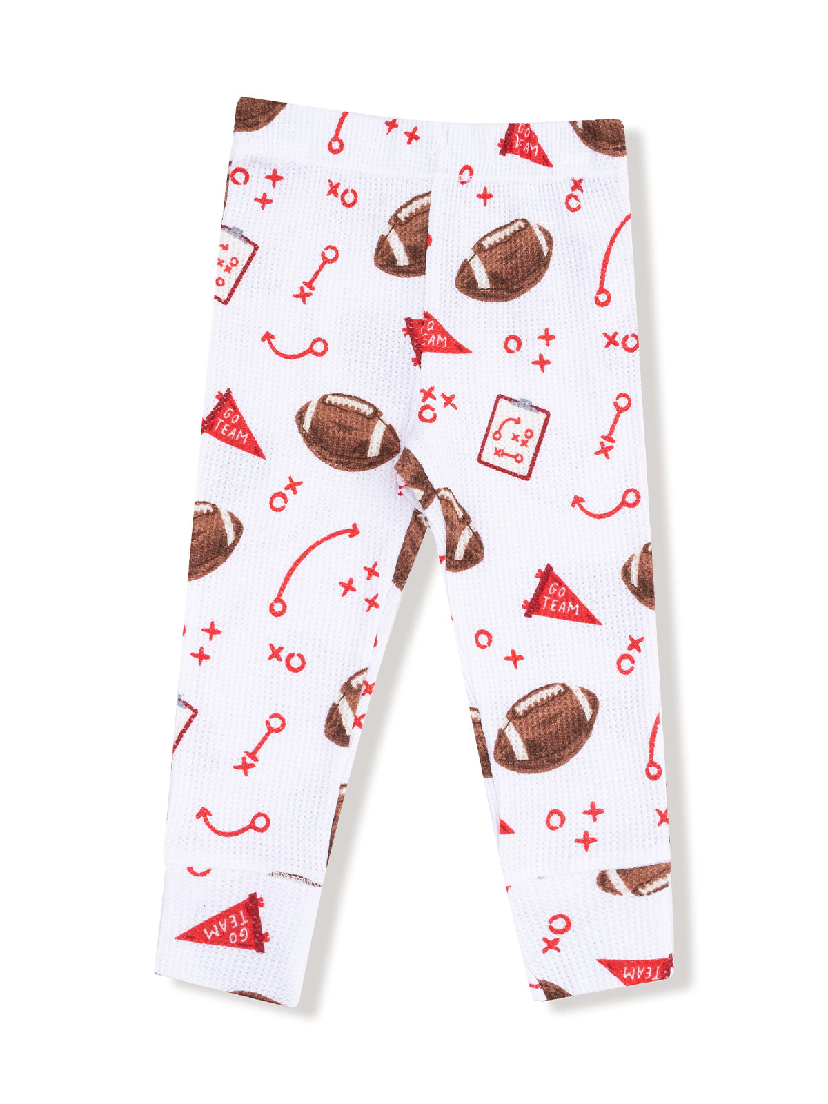 White leggings featuring a playful football print with red accents and game-related symbols.