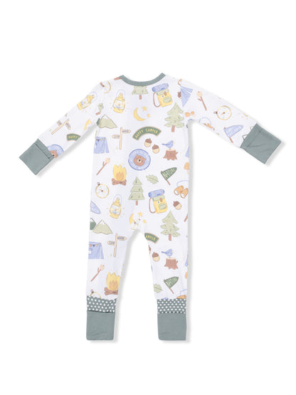 Child's camping-themed onesie featuring playful prints of tents, lanterns, and nature elements.