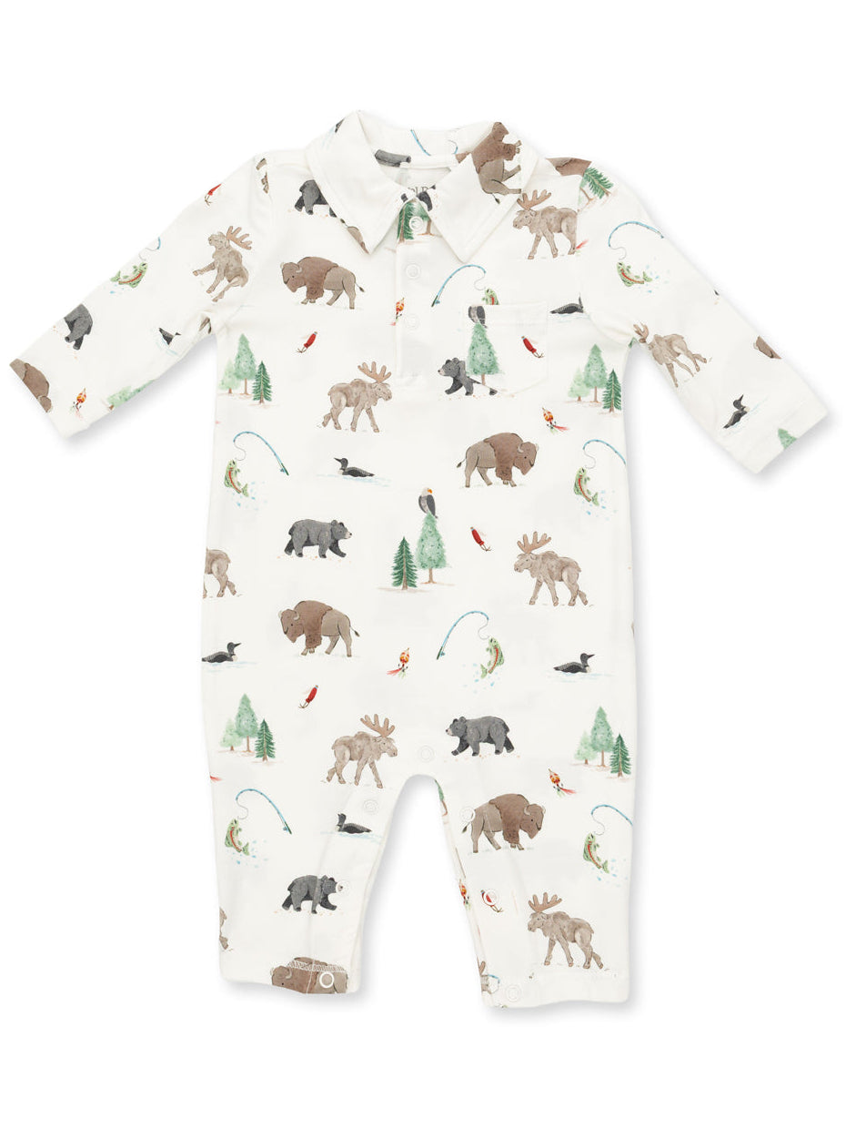 Patterned infant romper featuring forest animals like moose, bears, and birds on a light background.
