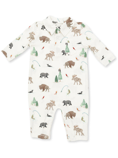 Patterned infant romper featuring forest animals like moose, bears, and birds on a light background.