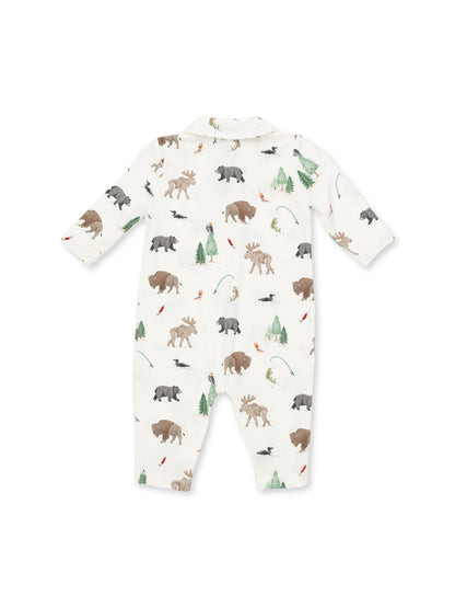 Baby onesie featuring a whimsical animal and nature print with bears, moose, fish, and trees, shown from the back.