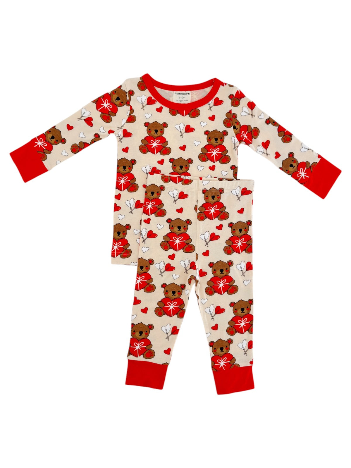Children's pajamas featuring a bear pattern with hearts and gifts, red accents, and long sleeves.