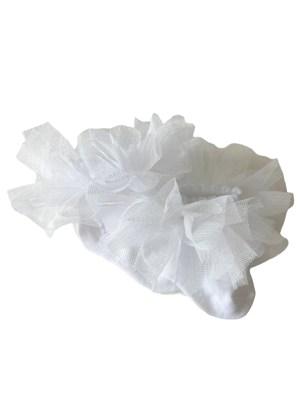 White sock with a decorative tulle flower detail, perfect for special occasions and stylish outfits.