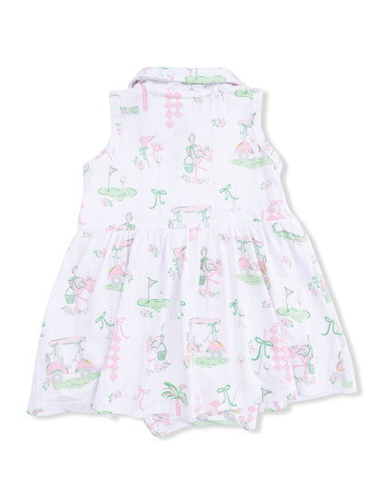 Patterned baby dress with golf and flamingo motifs in pastel colors. Ideal for warm weather wear.