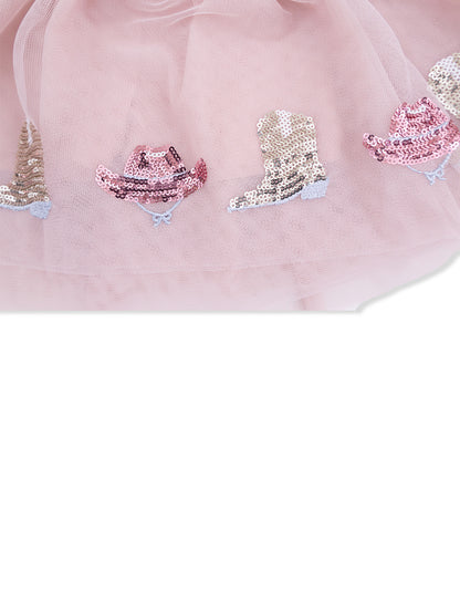 Pink tulle fabric adorned with sequined cowboy hats and boots in soft pastel colors.