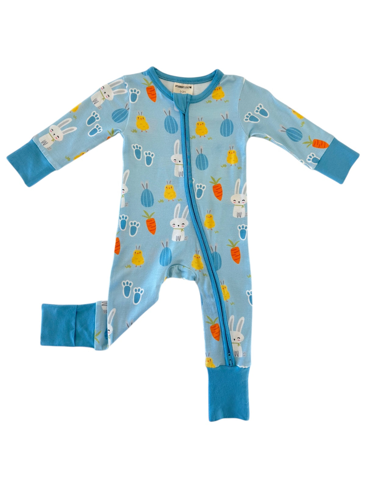 Light blue baby onesie featuring rabbits, chicks, and carrots in a playful print, zippered front, and long sleeves.