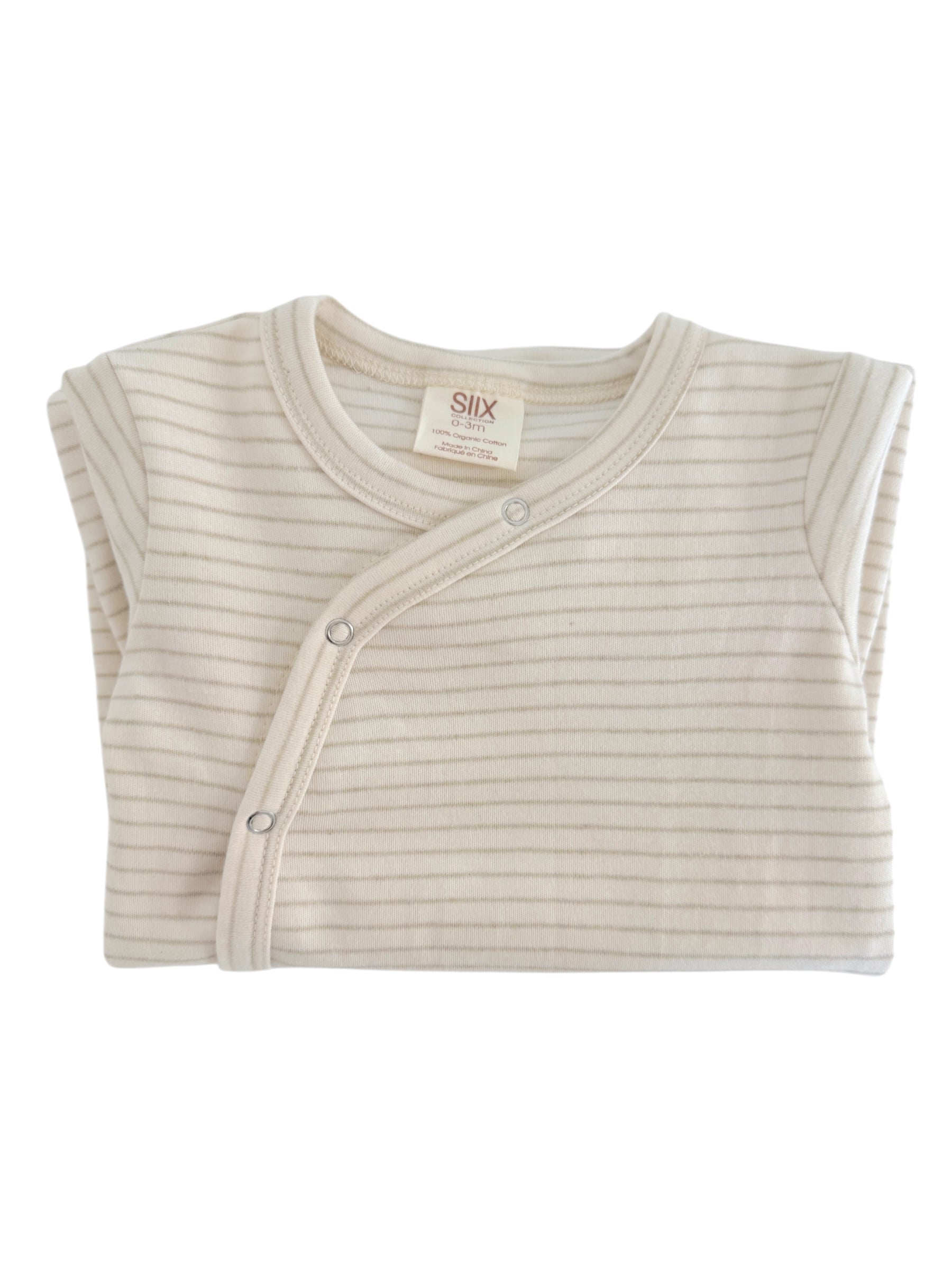 Cream-colored infant bodysuit with light stripes and snap closures. Soft, 100% cotton fabric.