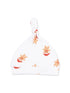 White baby hat featuring gingerbread man print with a knot on top. Ideal for warmth and cuteness.