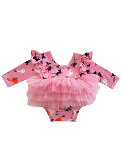 Pink Halloween-themed baby bodysuit with ruffles, featuring ghosts, cats, and pumpkins. Perfect for festive occasions.