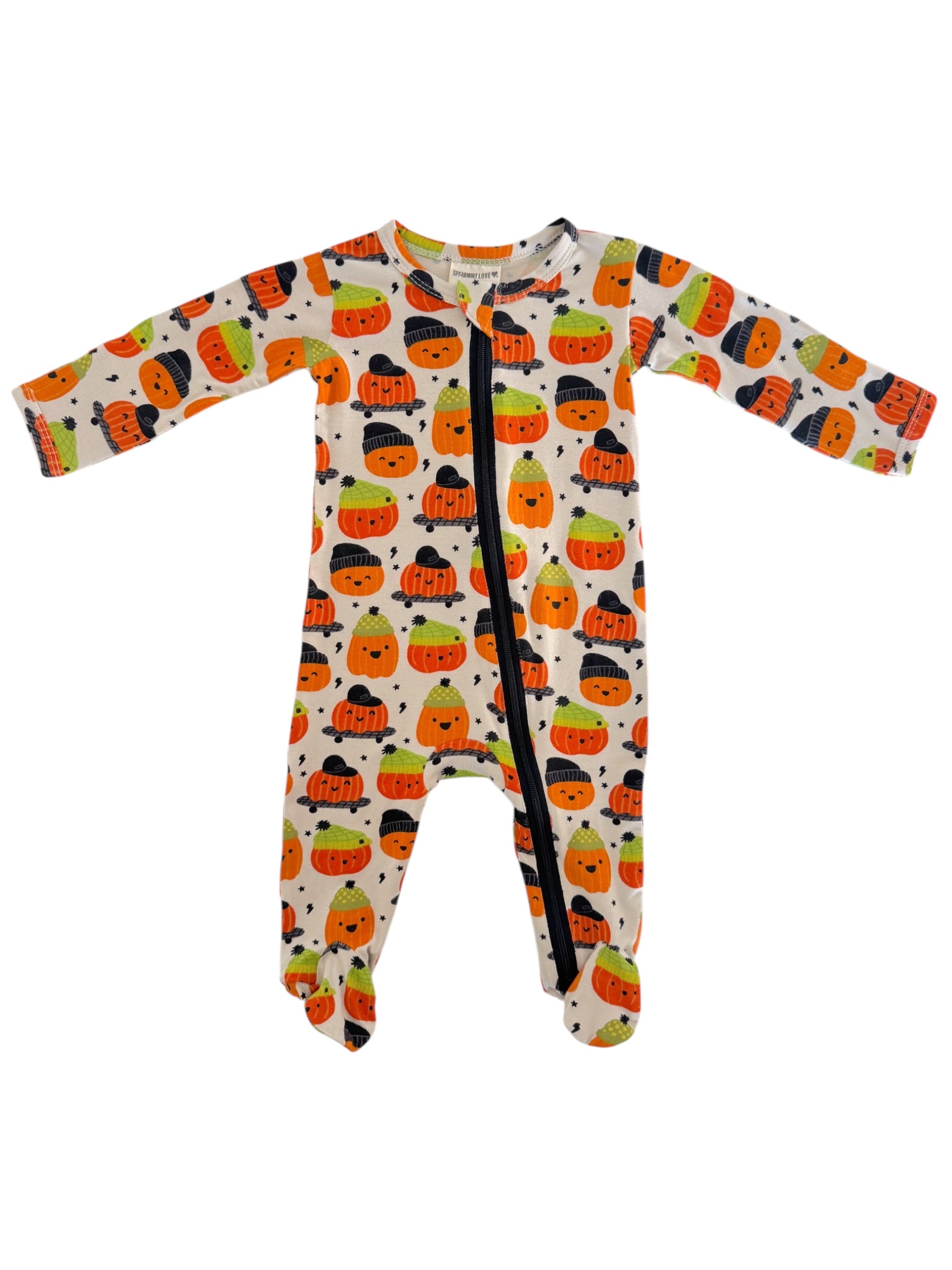 Baby onesie with colorful pumpkin and candy corn design, featuring a front zipper and footed legs.