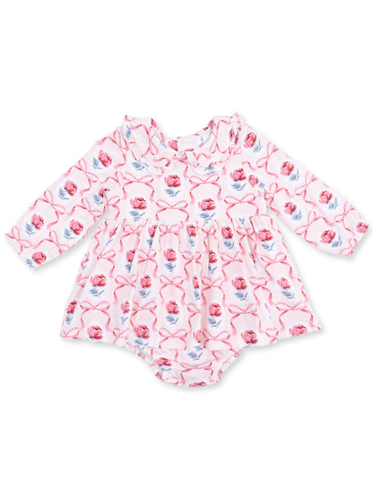 Baby girl's long-sleeve romper with a floral and ribbon design in soft pink tones. Perfect for casual wear.