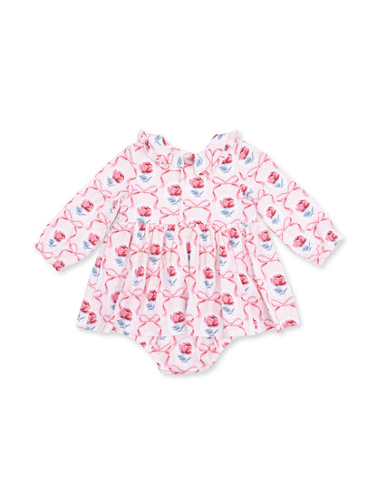 Floral baby dress with long sleeves, ruffled collar, and pink and blue rose pattern on a white background.