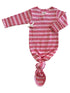 Pink baby gown with red heart patterns, featuring long sleeves and a knotted bottom for easy dressing.