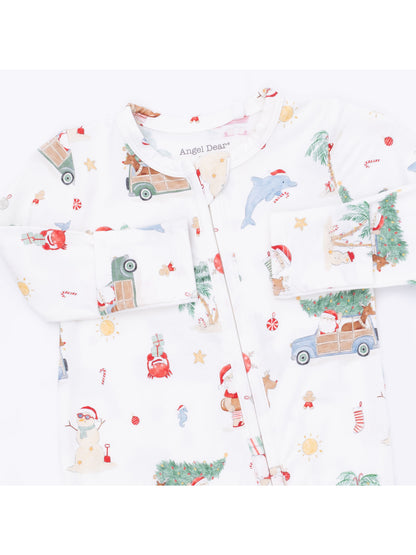 White baby onesie featuring festive Christmas illustrations of animals, Santa, and holiday decorations.