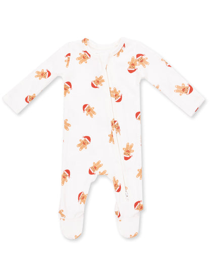 White onesie with gingerbread men wearing Santa hats, featuring a zipper and long sleeves. Ideal for holiday wear.