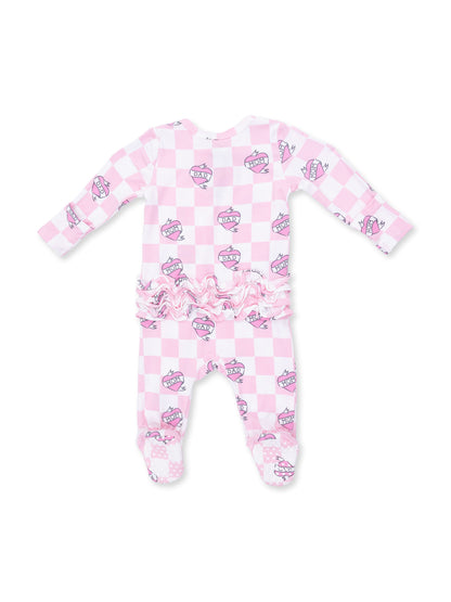 Pink checkered onesie with cupcake and heart graphics, featuring ruffled waist and footed design for infants.