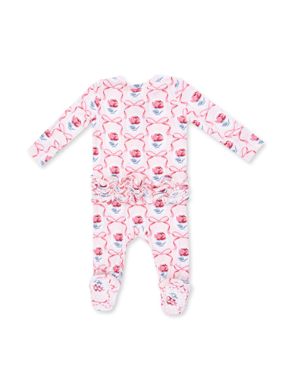 Floral-patterned baby onesie in pink with a ruffled waist and footed design.