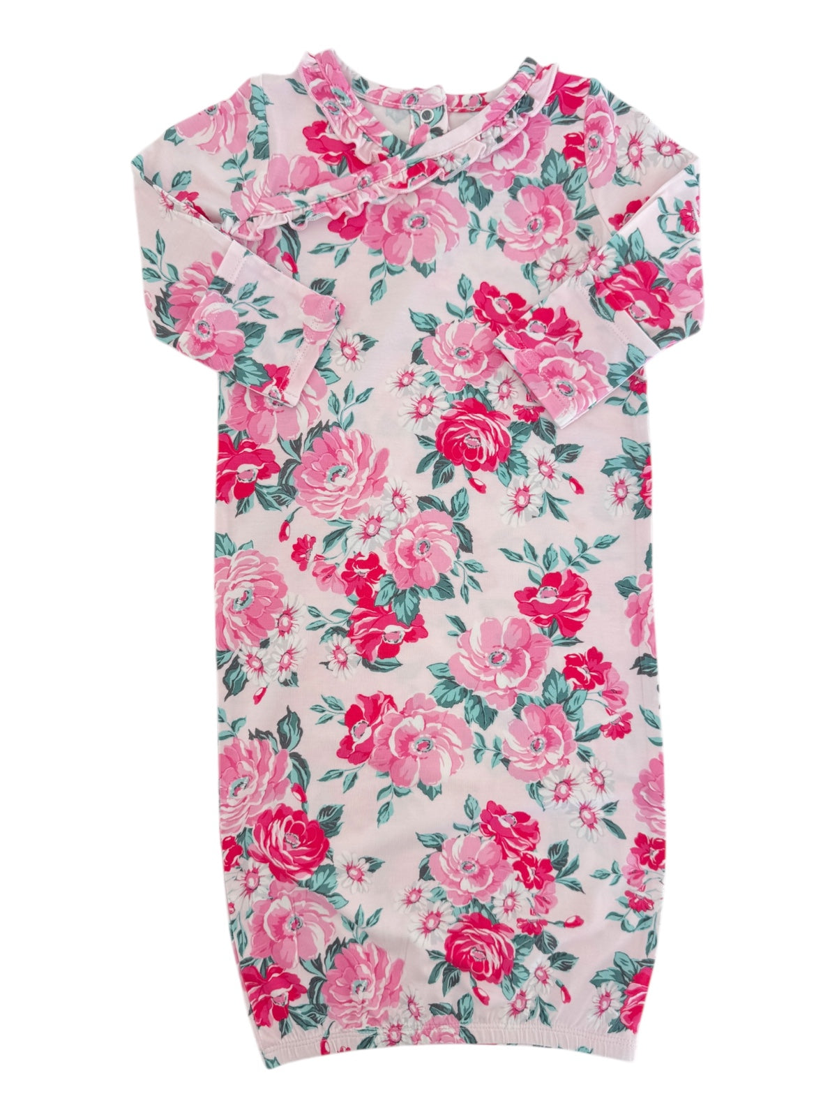 Floral-printed children's dress featuring pink roses on a light background and a ruffled neckline.