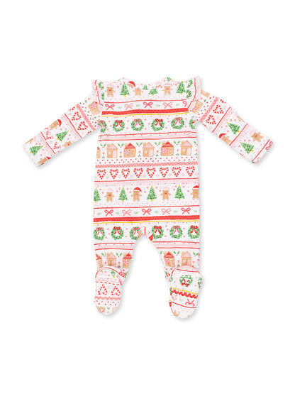 Holiday-themed baby onesie featuring gingerbread, Christmas trees, and decorative patterns in red and green.