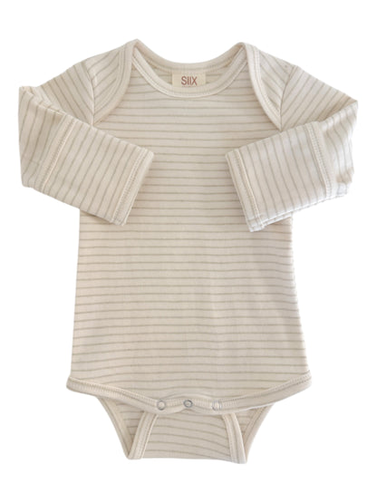 Lightly striped long-sleeve baby bodysuit with snap closures at the bottom, cream color.