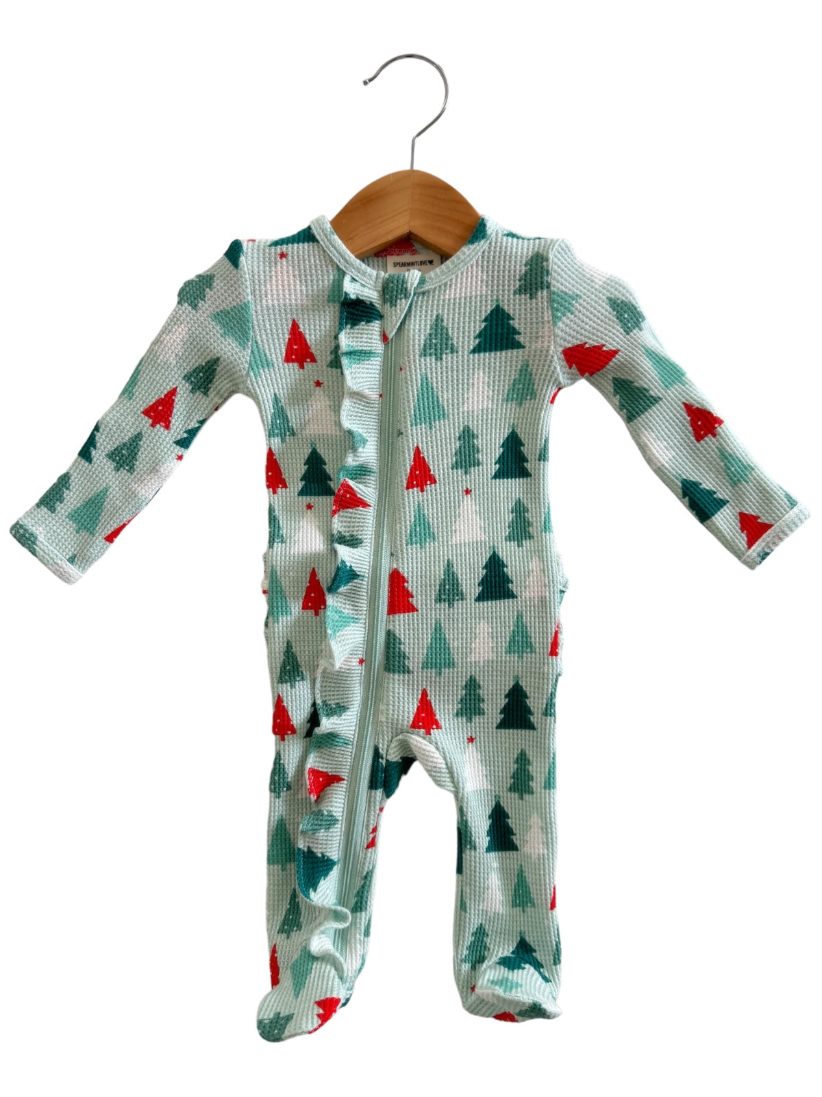 Green and white striped onesie with red and green Christmas tree pattern, featuring a front zipper and ruffle trim.