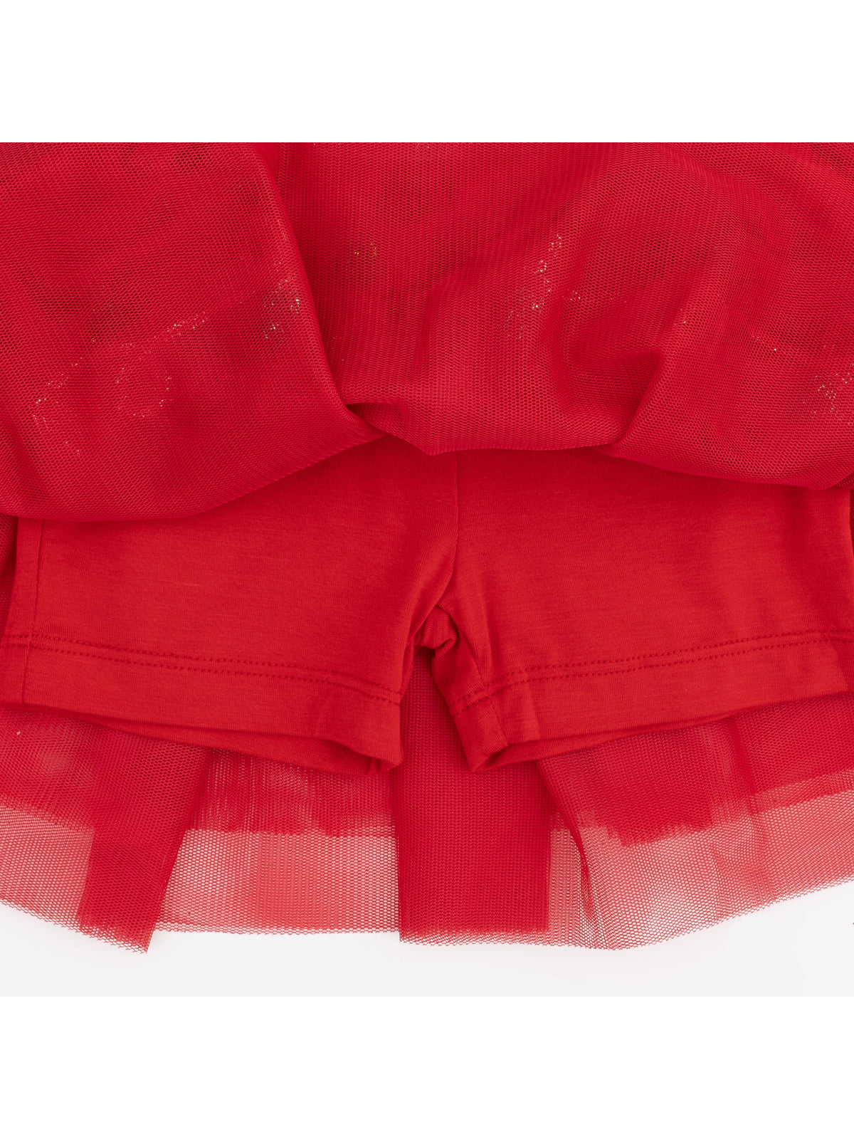 Red mesh top layered over matching red shorts, showcasing a playful and vibrant outfit for kids.