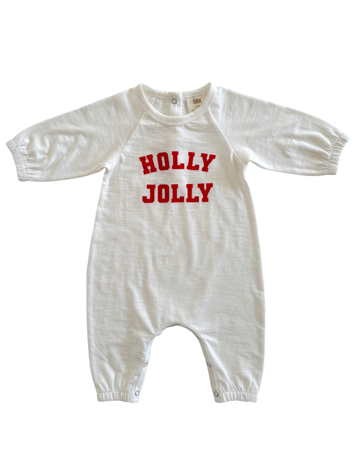 White baby onesie with red text reading "HOLLY JOLLY" on the front, featuring long sleeves and snap closures.