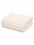 Folded cream-colored towel with a textured surface on a white background.