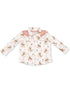 Child's western-style shirt with colorful cowboy print and pink yoke detail. Long sleeves, button-up front.