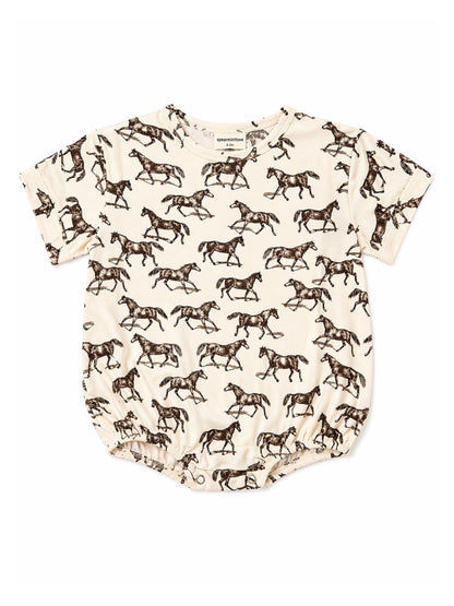 Light cream baby onesie featuring a pattern of galloping horses in brown. Soft, comfortable fabric for infants.