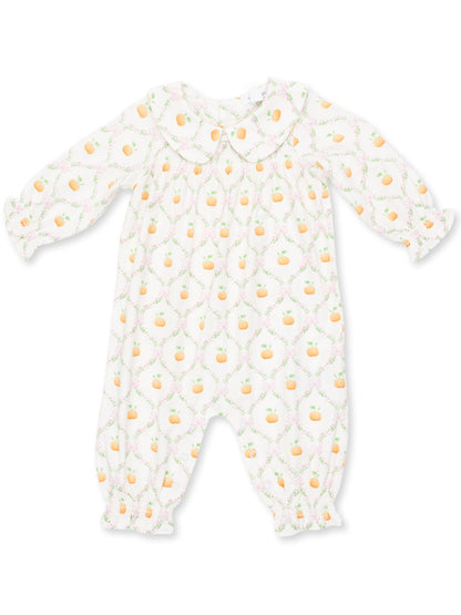 Baby romper with a subtle pumpkin pattern, featuring a collar and gathered sleeves. Perfect for cozy outfits.