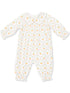 Baby romper with a subtle pumpkin pattern, featuring a collar and gathered sleeves. Perfect for cozy outfits.