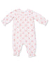 White long-sleeve baby romper with pink floral pattern and snap closures at the bottom.