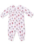 White baby onesie featuring colorful hot air balloon patterns. Long sleeves with elastic cuffs.